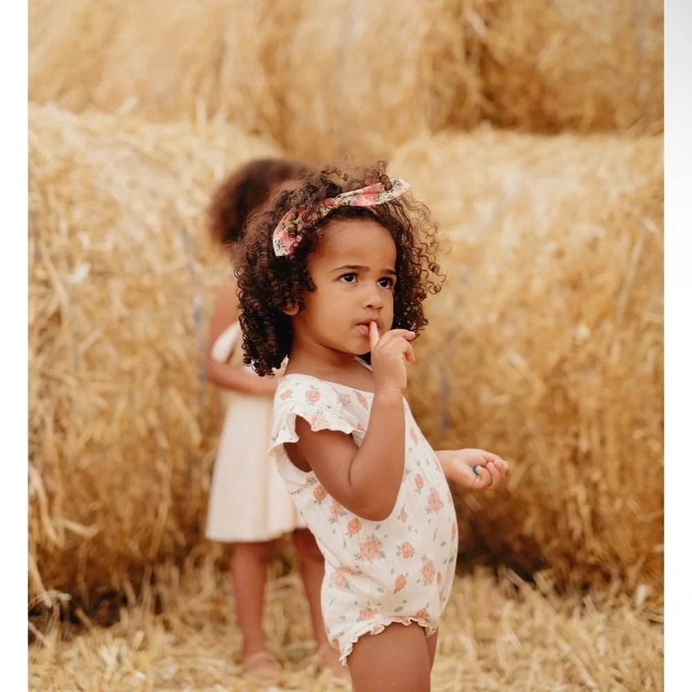 Floral Baby Onesie by louise misha